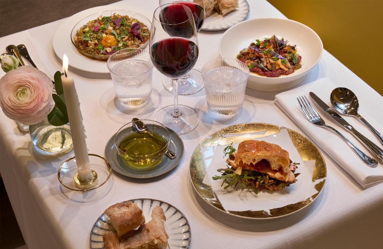 Villa Dagmar Stockholm Ngoại thất bức ảnh A selection of dishes at the restaurant